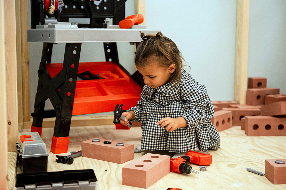 Child playing in ball pit