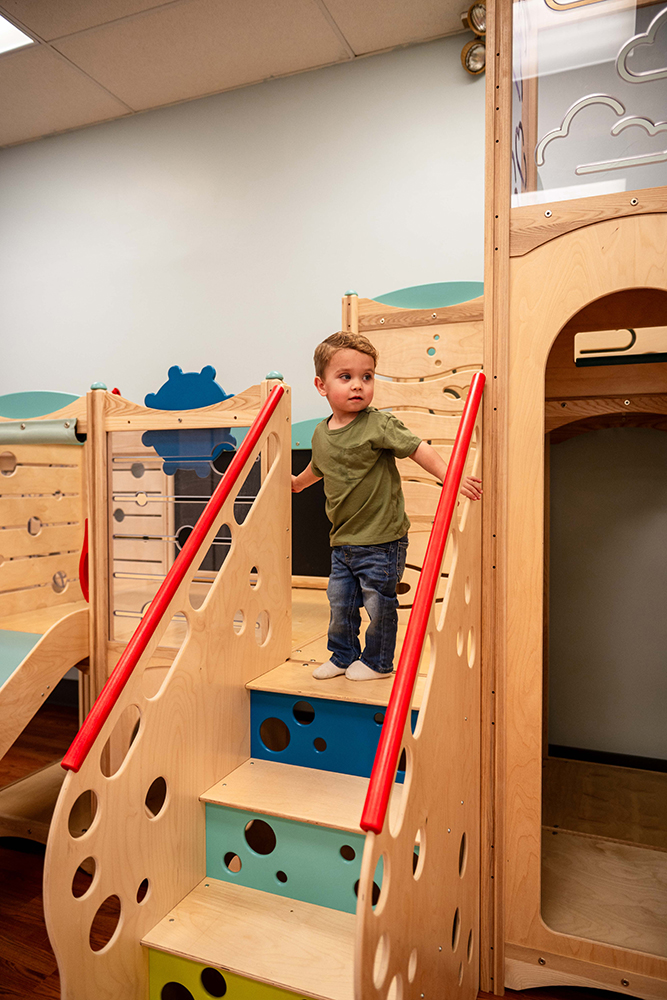 Child playing in ball pit